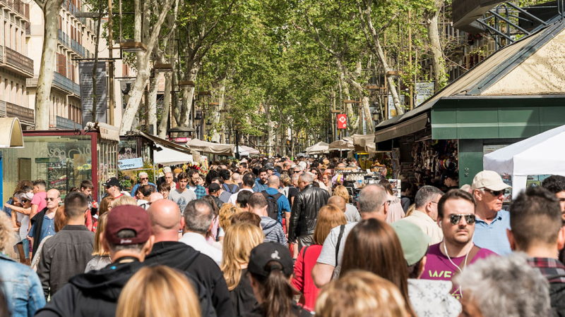 View of the stands and people on la Rambla