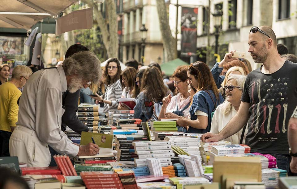 Booksellers at their stands attending the shoppers