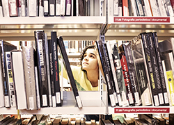 Girl holding a book at the library