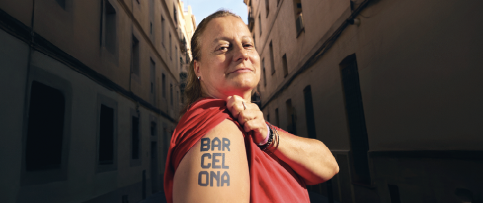 Woman with a Barcelona tattoo