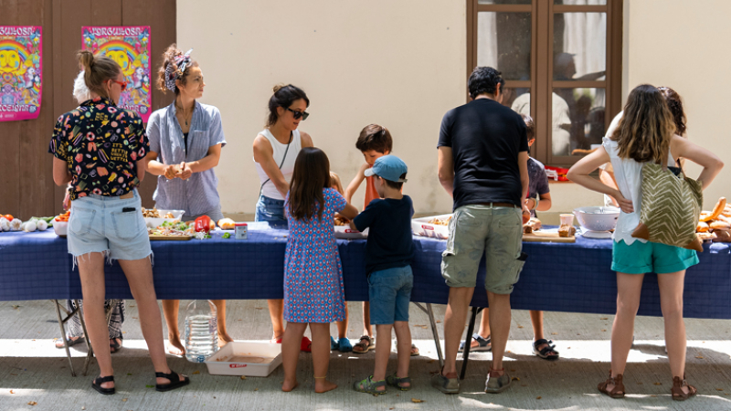 Gathering of diverse families in the district of Sant Martí