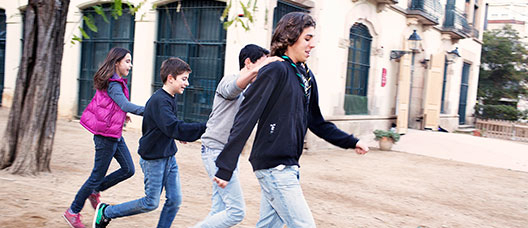 Group of children and young people running 