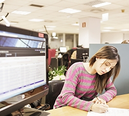 Woman signing an apartment rental contract  